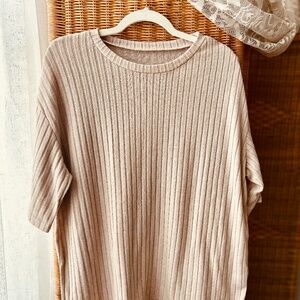 Minimal, boxy top. Medium, comfortable, and transitional.